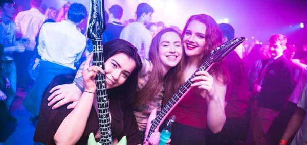 Image may contain: Bass Guitar, Leisure Activities, Guitar, Musical Instrument, Human, Person