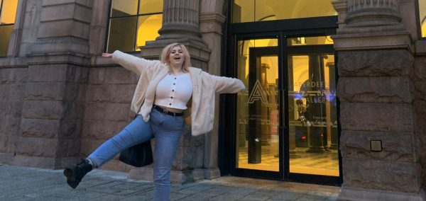 Image may contain: Female, Door, Jeans, Denim, Shoe, Footwear, Human, Person, Pants, Apparel, Clothing