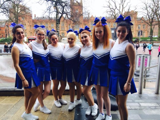 And finally QUB's cheerleader squad are spotted braving the cold in their matching uniforms! 