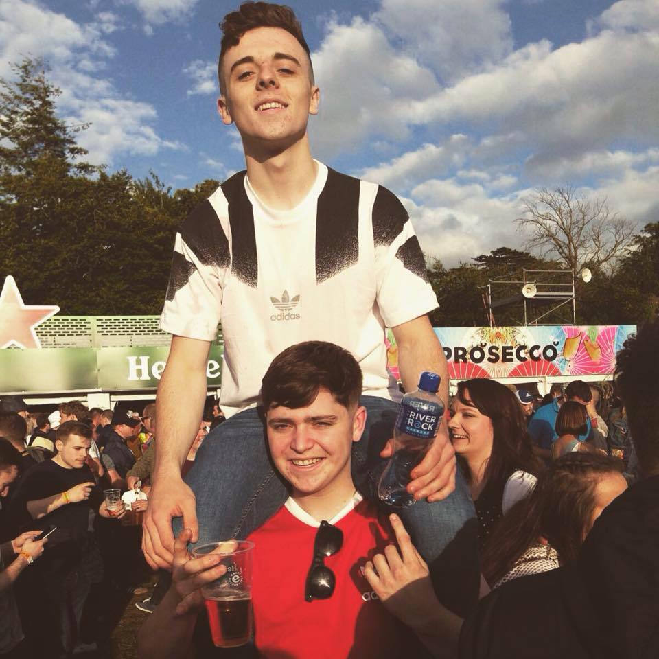 Pearse on his friend Darren's shoulders