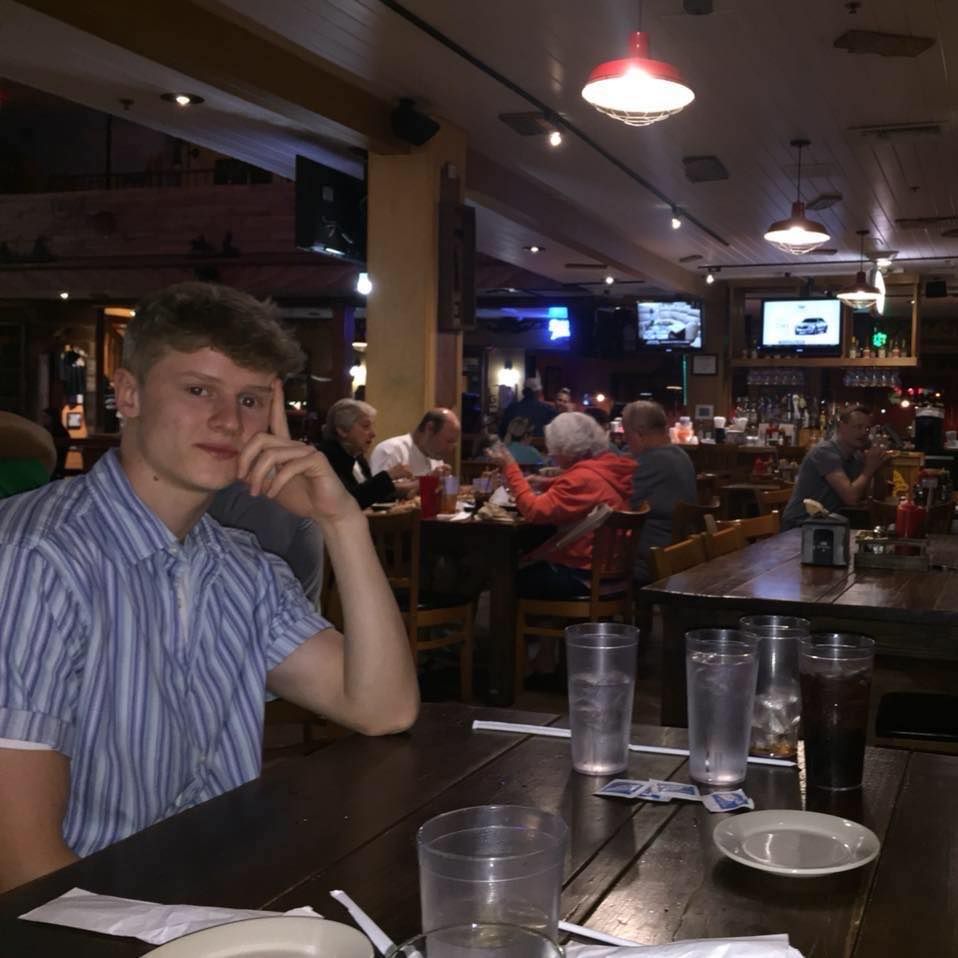 Image may contain: Table, Chair, Furniture, Bar Counter, Pub, Restaurant, Food, Food Court, Person, Human