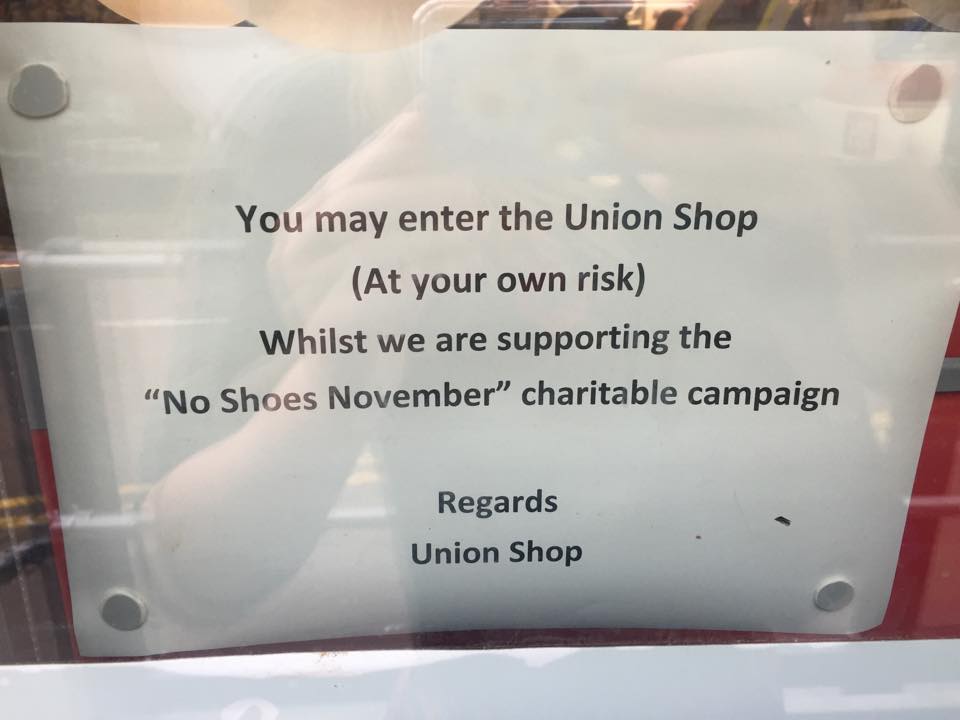 The (poorly-worded) sign now in the window