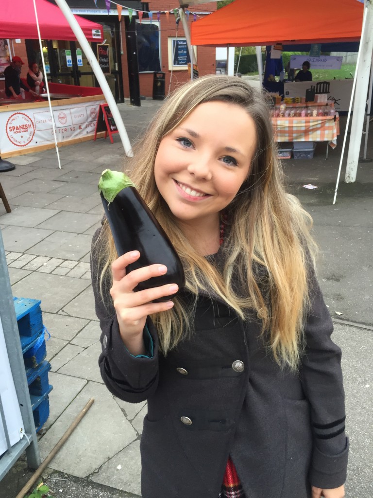 Happy to be alive and handling an aubergine