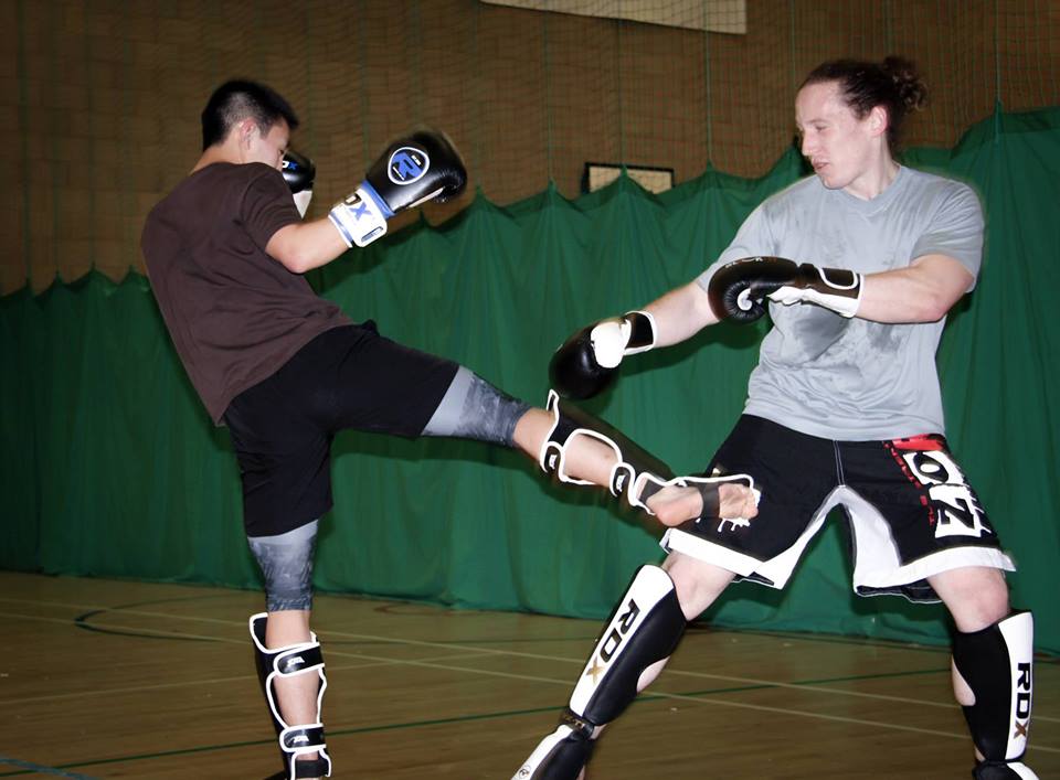 A beautiful round kick during a muay thai session