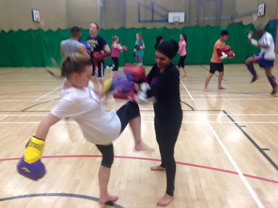 Our new president helping a team mate work on the pads