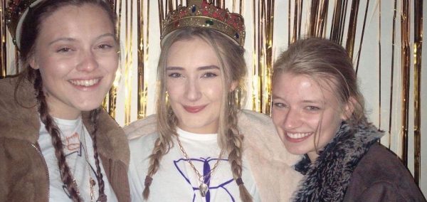 Image may contain: Costume, Crown, Scarf, Apparel, Clothing, Jewelry, Accessories, Accessory, Face, Human, Person