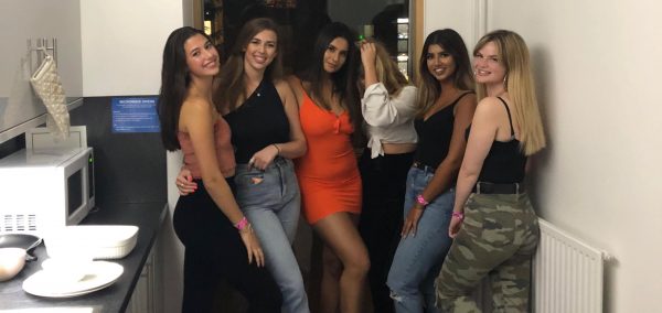 Image may contain: Skirt, Female, Club, Evening Dress, Gown, Fashion, Robe, Pants, Apparel, Clothing, Human, Person