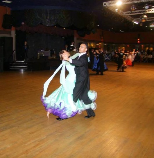 Team Captain Sophie Timbers and her partner Ali Naeem performing Quickstep