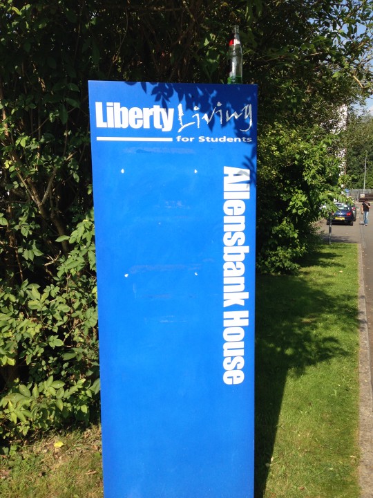 Liberty Living's expensive-looking sign afforded little protection to the students