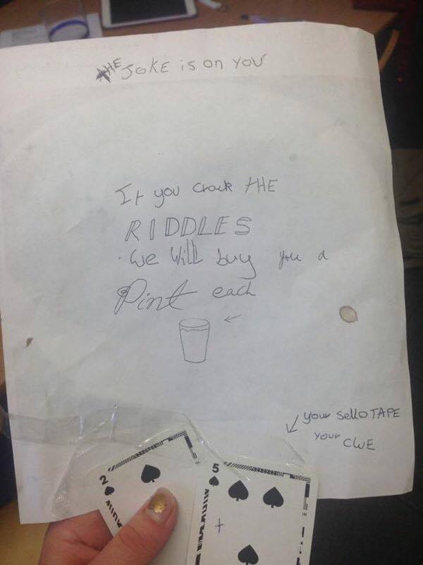 A envelope, inside of which were a photograph and cryptic riddle.