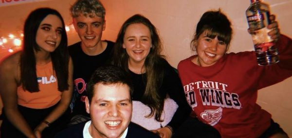 Image may contain: Party, Smile, Portrait, Face, Bottle, Person, People, Human