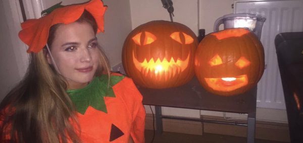 Image may contain: Person, People, Human, Vegetable, Squash, Pumpkin, Produce, Plant, Food, Flora