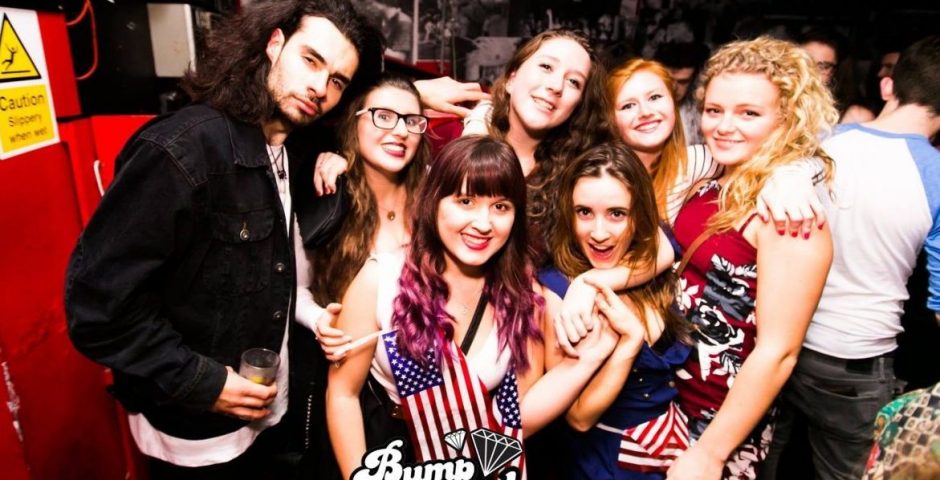 Image may contain: Club, American Flag, Night Life, Face, Flag, Symbol, Party, Glasses, Accessory, Accessories, Human, Person