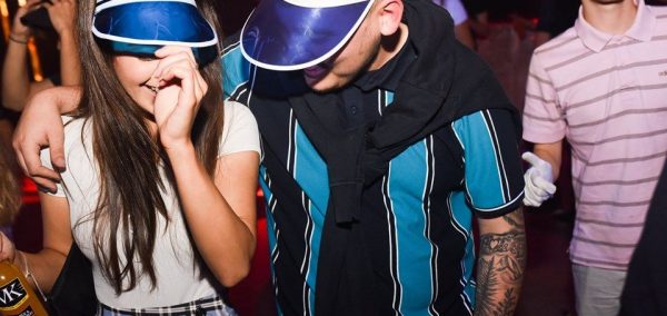 Image may contain: Female, Cap, Tattoo, Face, Sunglasses, Accessory, Accessories, Hat, Skin, Clothing, Apparel, Person, Human