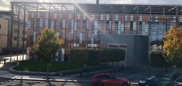 Image may contain: Apartment Building, Metropolis, Office Building, Convention Center, Architecture, Downtown, Road, Street, Neighborhood, High Rise, Transportation, Vehicle, Car, Automobile, City, Town, Urban, Building, Housing, Condo