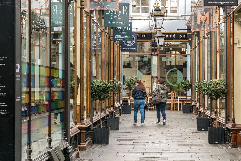 Image may contain: Restaurant, Wood, Flagstone, Path, Pedestrian, Alleyway, Alley, Denim, Jeans, Indoors, Interior Design, Footwear, Shoe, Clothing, Apparel, Pants, Town, Building, Street, Urban, Road, City, Person, Human