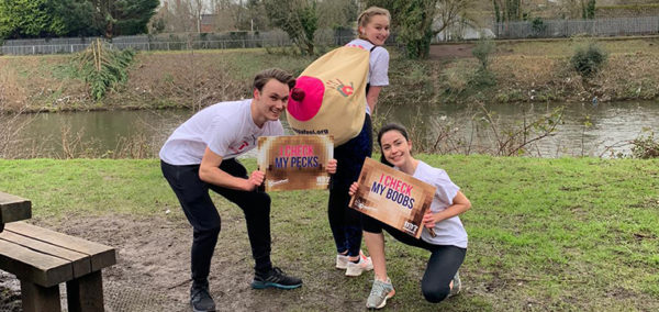 inflattable boob running three people