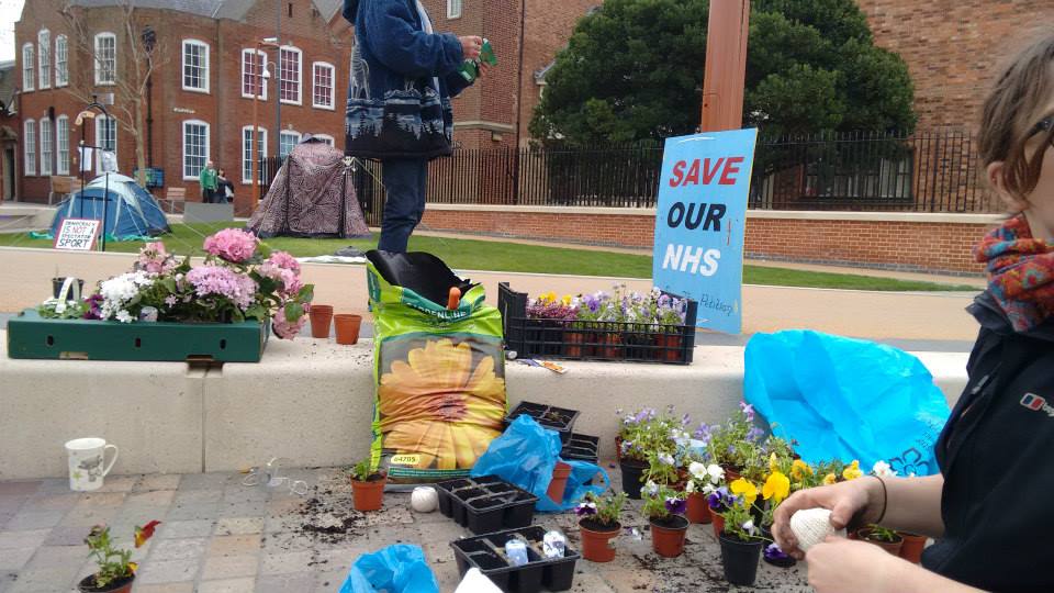 Guerilla Gardening to brighten up the streets of Leicester during their protests