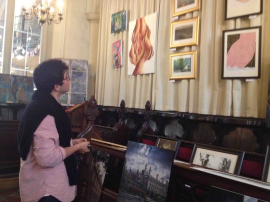 Residents of Cambridge admire the art