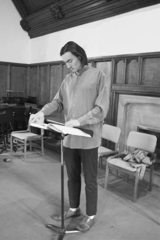 Director George Kan looking over the, um, 'speaking score'