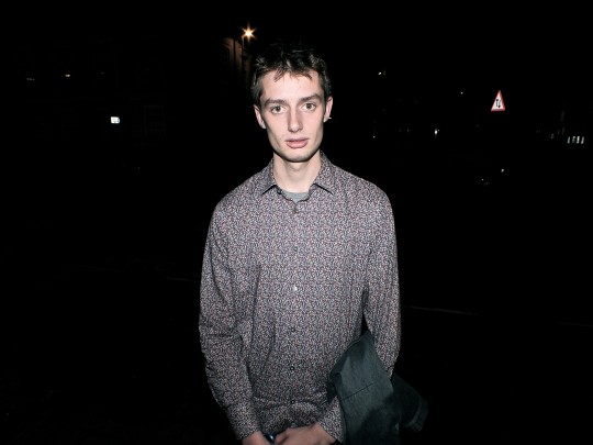 Sharp shirt. Sharp cheekbones. Sharp guy.