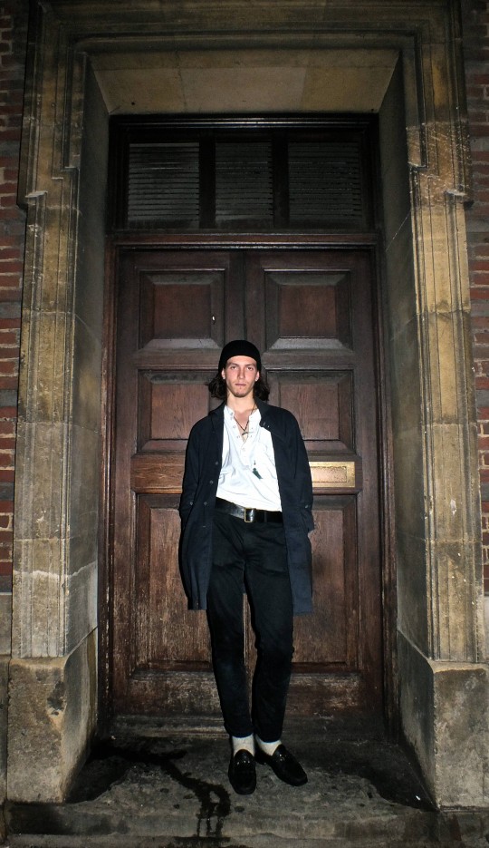 That stare. That fang. Almost as imposing as that door.