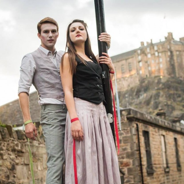 Oli MacFarlane as Pippin and Caroline Sautter as Leading Player