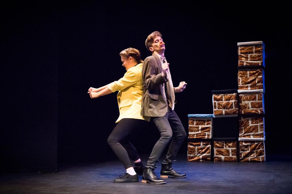 Aoife Kennan as Tranio and Robbie Taylor-Hunt as Merchant