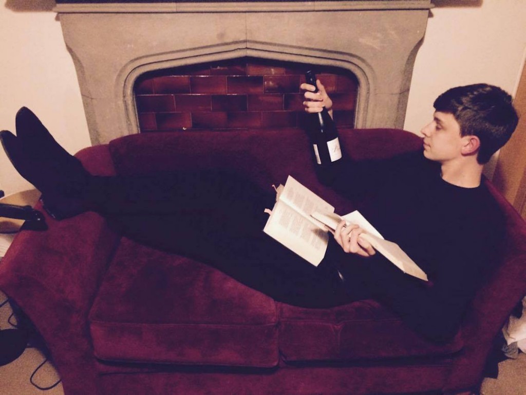 Exhibit A: Wine in one hand, book (aka symbol of procrastination) in the other. General existentialism over-compensated for by vanity all around.