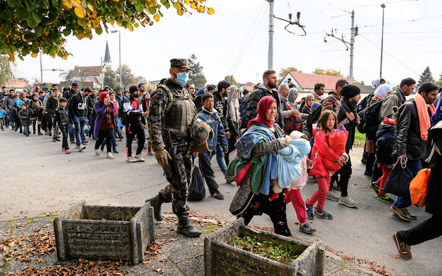 May will argue he is diminishing the suffering of refugees