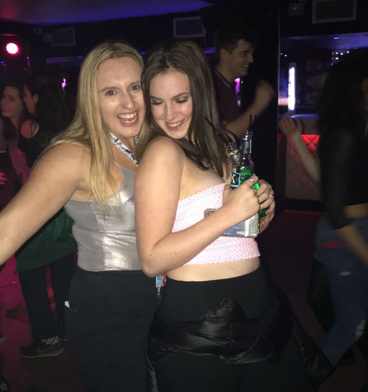 Image may contain: Club, Drink, Beverage, Alcohol, Person, People, Human