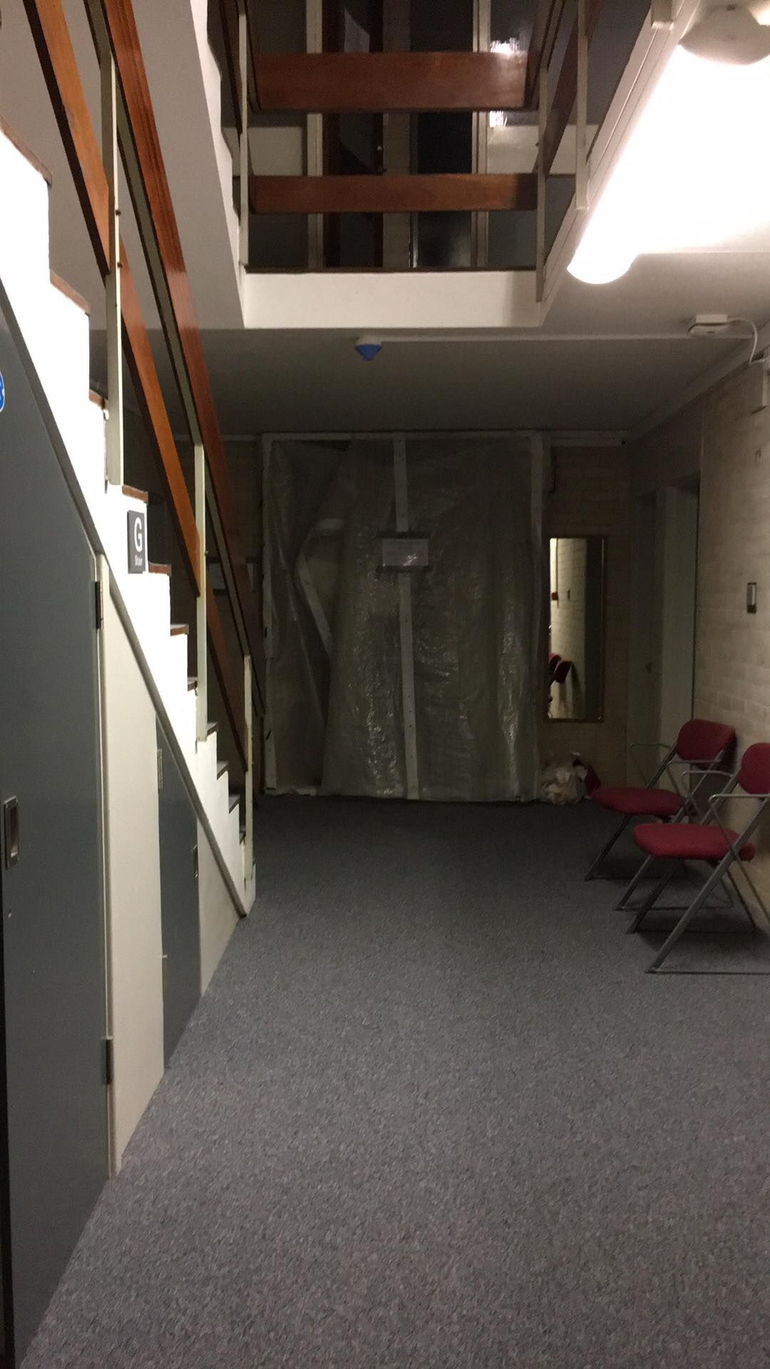 Image may contain: Furniture, Chair, Corridor