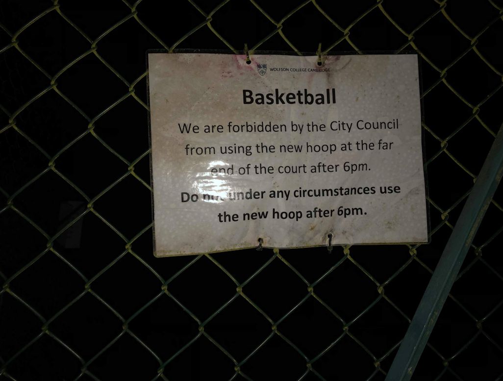 Image may contain: Plaque, Fence, Text