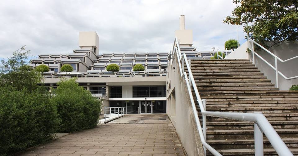 Image may contain: Architecture, Housing, Office Building, Railing, Building, Handrail, Banister