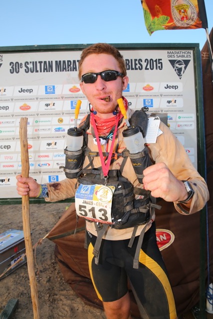 On the finish line. Walking stick and cigar in tow.