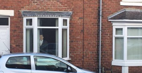 Image may contain: Van, Vehicle, Car, Automobile, Gutter, Brick, Window, Human, Person, People