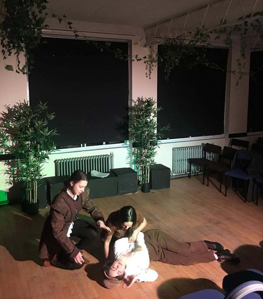 Image may contain: Restaurant, Suit, Overcoat, Coat, Clothing, Bench, Vase, Pottery, Potted Plant, Plant, Jar, Flora, Person, People, Human