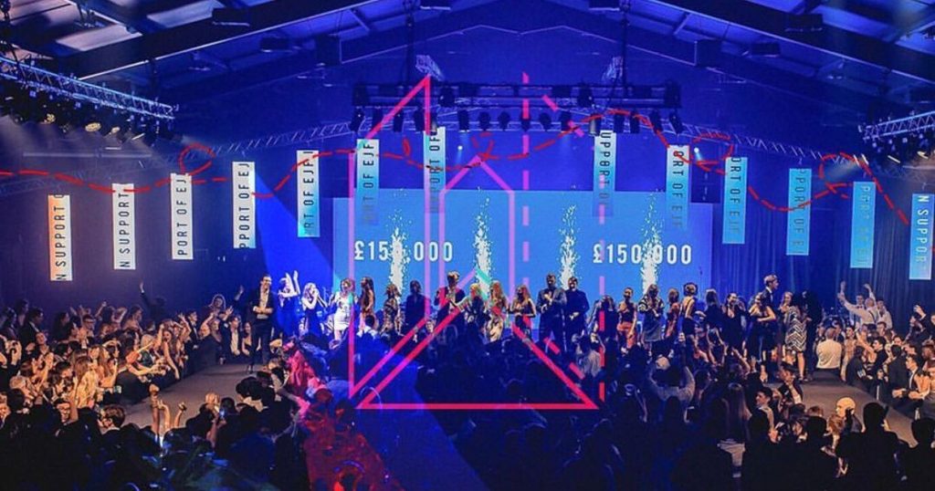 Image may contain: Audience, Night Life, Night Club, Crowd, Club, Person, Human, Lighting