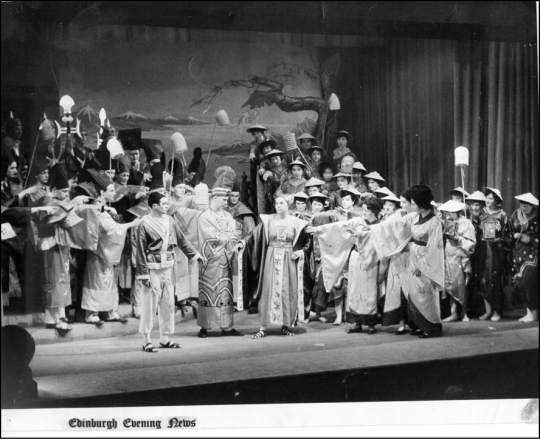 A newspaper clipping documenting EUSOG's first production in 1961.