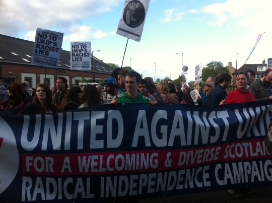 This is no rabble of mindless orcs. These are uruk-hai. Their slogans thick and their placards broad
