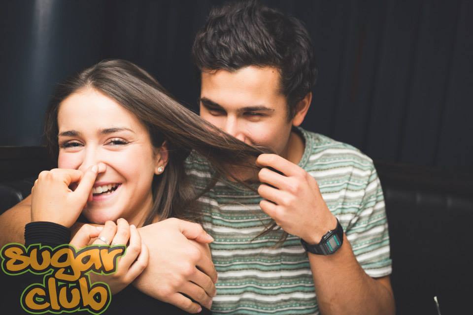 She's smiling so I assume it's consensual.