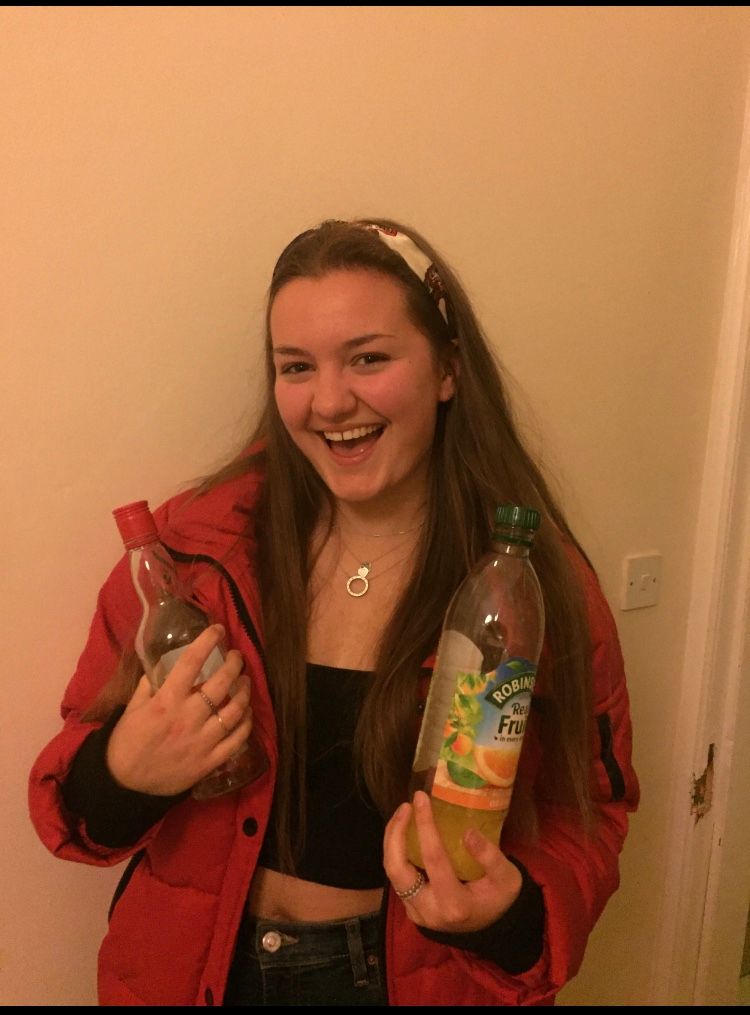 Image may contain: Drink, Bottle, Beverage, Beer Bottle, Beer, Alcohol, Person, People, Human