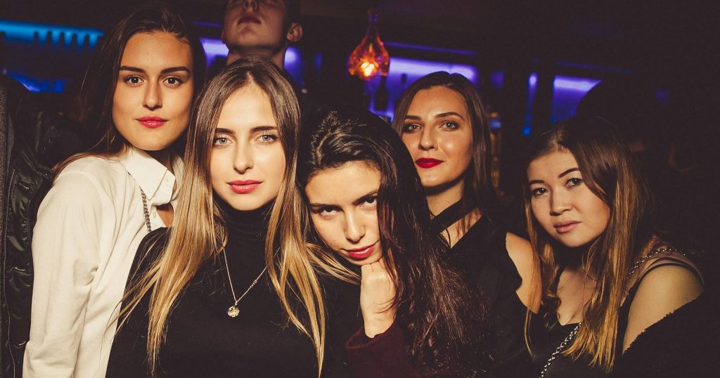 Image may contain: Haircut, Hair, Night Life, Night Club, Club, Person, People, Human