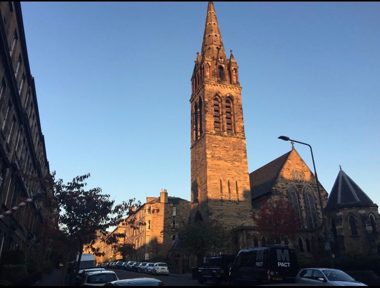 Image may contain: Bell Tower, Vehicle, Automobile, Transportation, Car, Architecture, Tower, Steeple, Spire, Building