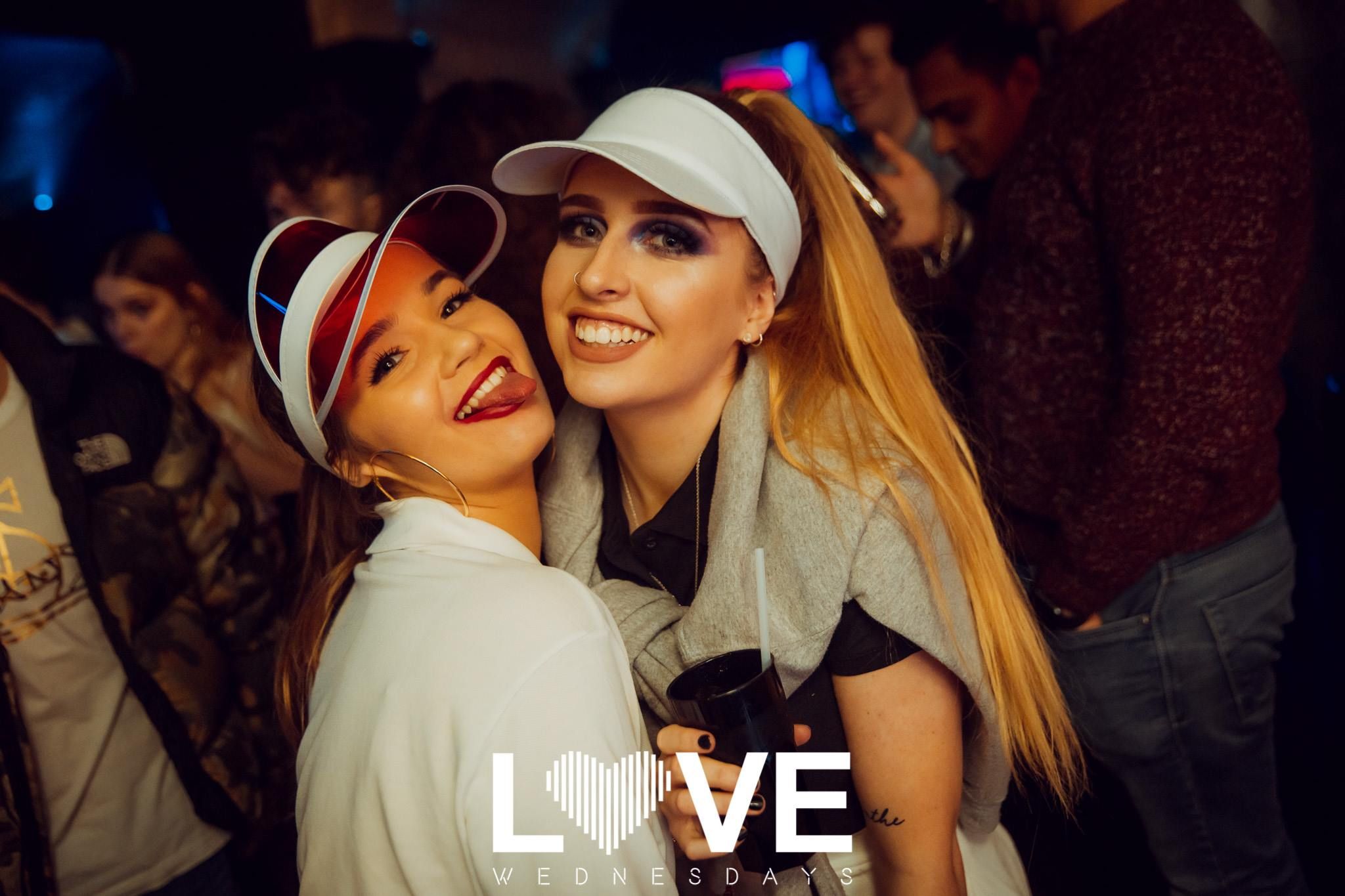 Image may contain: Dating, Face, Sunglasses, Accessory, Accessories, Night Life, Party, Clothing, Apparel, Hat, Night Club, Club, Human, Person
