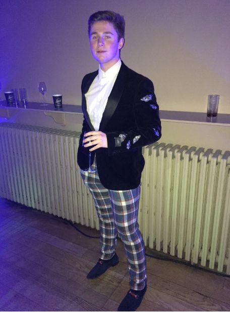 Image may contain: Woman, Face, Man, Pants, Footwear, Shoe, Female, Person, Human, Jacket, Blazer, Suit, Coat, Overcoat, Clothing, Apparel