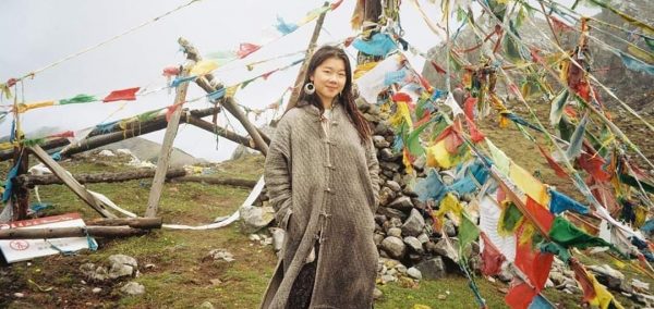 Image may contain: Coat, Face, Dress, Kid, Woman, Blonde, Teen, Girl, Child, Person, Human, Female, Clothing, Apparel