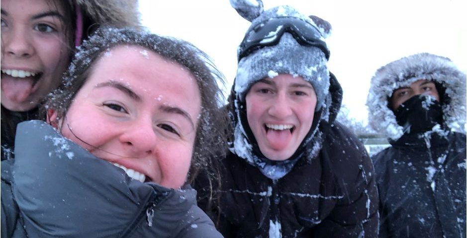 Image may contain: Mountain, Photo, Photography, Portrait, Hood, Storm, Female, Winter, Smile, Jacket, Snow, Ice, Coat, Person, Face, Human, Outdoors, Nature, Clothing, Apparel