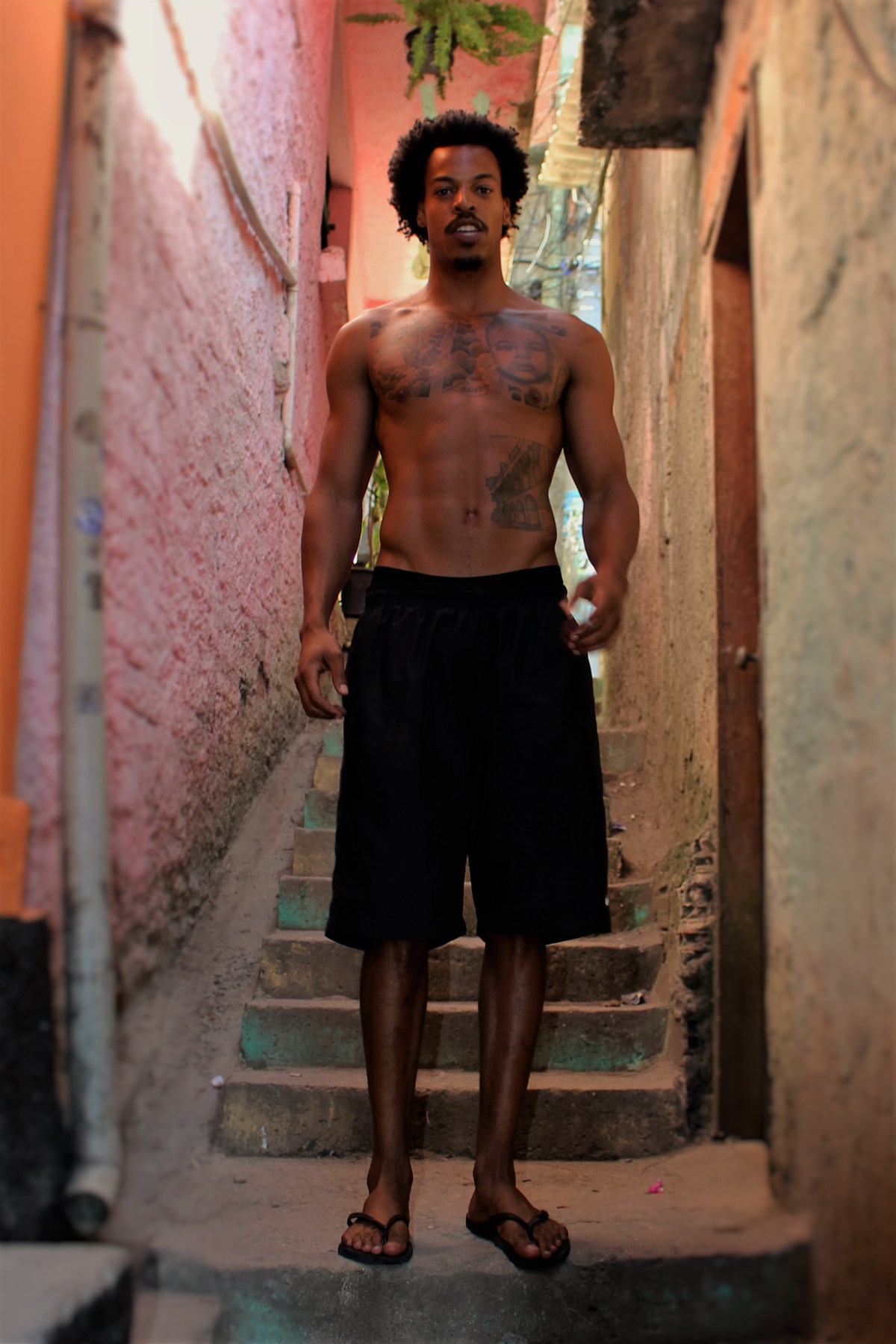 Oberdan standing on a staircase in Vidigal