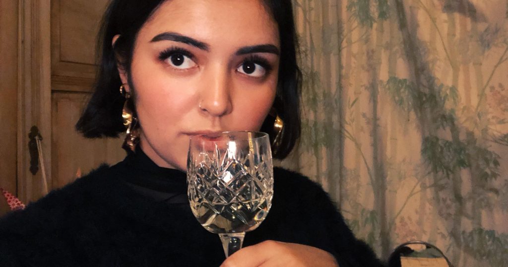 Image may contain: Finger, Wine Glass, Wine, Alcohol, Drink, Beverage, Person, Human, Goblet, Glass